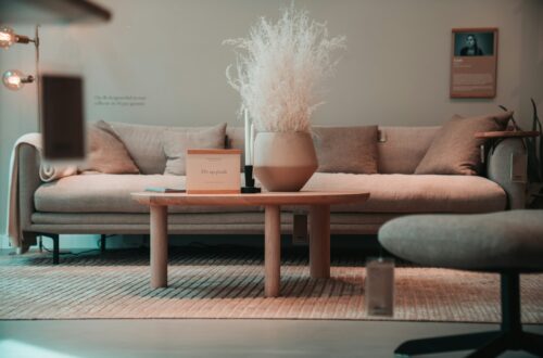 a living room with a couch and a table