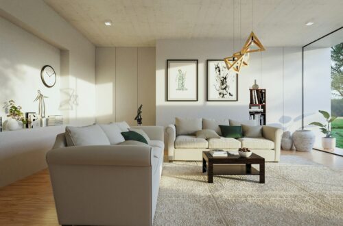 a living room filled with furniture and a large window